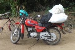 The motobikes we used to get around, often fording streams and rivers. We hit 60 kmh (37 mph) on jungle paths barely wide enough for two people to walk abreast.