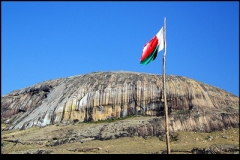 The flag of Madagascar flying in Andringitra National Park.