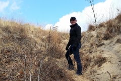 Christina Bergey conquering a dune in Indiana Dunes State Park.